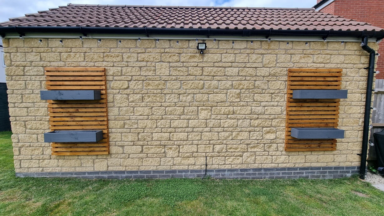 Wall Highlights With Planter Boxes